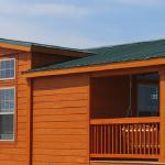APH Mahogany Stain with Green Steel Roof