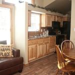 The Honeysuckle Model P-504 by Platinum Cottages and RRC Athens. This wheelchair friendly model features a roll-in shower w/ grab bars and a fold down seat. it also features wider doorways and other features making accessibility easier.