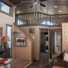 The Meadowview P-528FPSPSL wrap around porch model by Platinum Cottages & RRC Athens. See above for the floorplan, pictures, pricing and a virtual tour of this model currently on display in Athens TX.