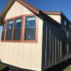 The Magnolia P-518 front kitchen model by Platinum Cottages previously on display @ RRC Athens. This model is shown with optional clerestory windows and more.