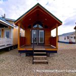 The Timberline 566SLFP model by Platinum Cottages and RRC Athens. This rustic park model cabin is shown with many upgrades including cedar interior pkg with Hickory cabs, a front porch, loft, washer/dryer front loads installed, and more!!